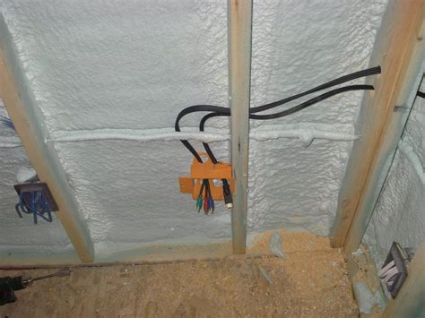 electrical boxes are usually fastened to studs with|screwed into stud box.